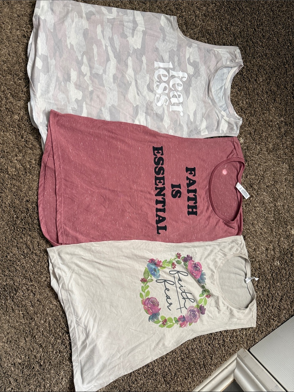 Various women’s ' Pink Graphic workout Tank Tops